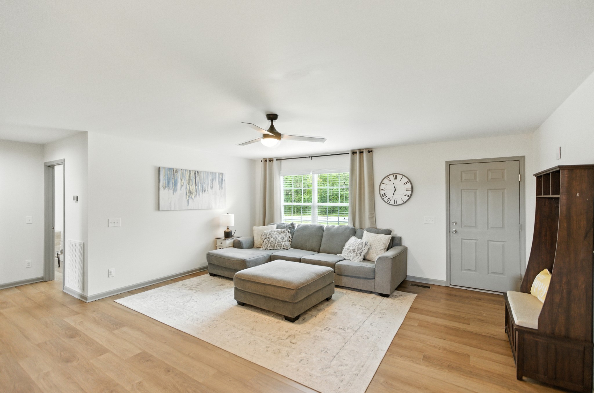 6411 Spring Creek Road Tullahoma, TN 37388 - Photo 14 of 57 a living room with furniture and a flat screen tv