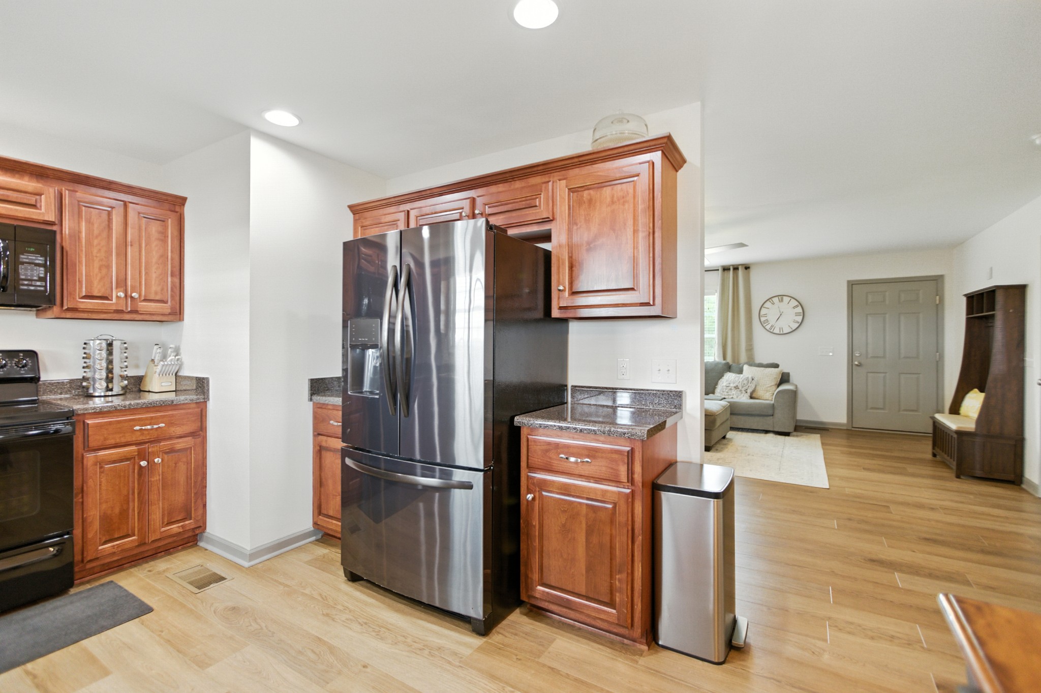 6411 Spring Creek Road Tullahoma, TN 37388 - Photo 23 of 57 a kitchen with stainless steel appliances granite countertop a refrigerator stove and sink