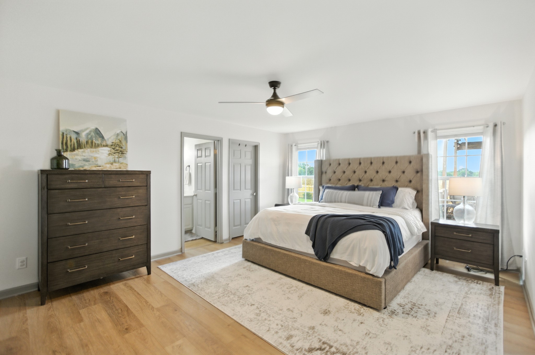 6411 Spring Creek Road Tullahoma, TN 37388 - Photo 24 of 57 a bedroom with a bed and a dresser