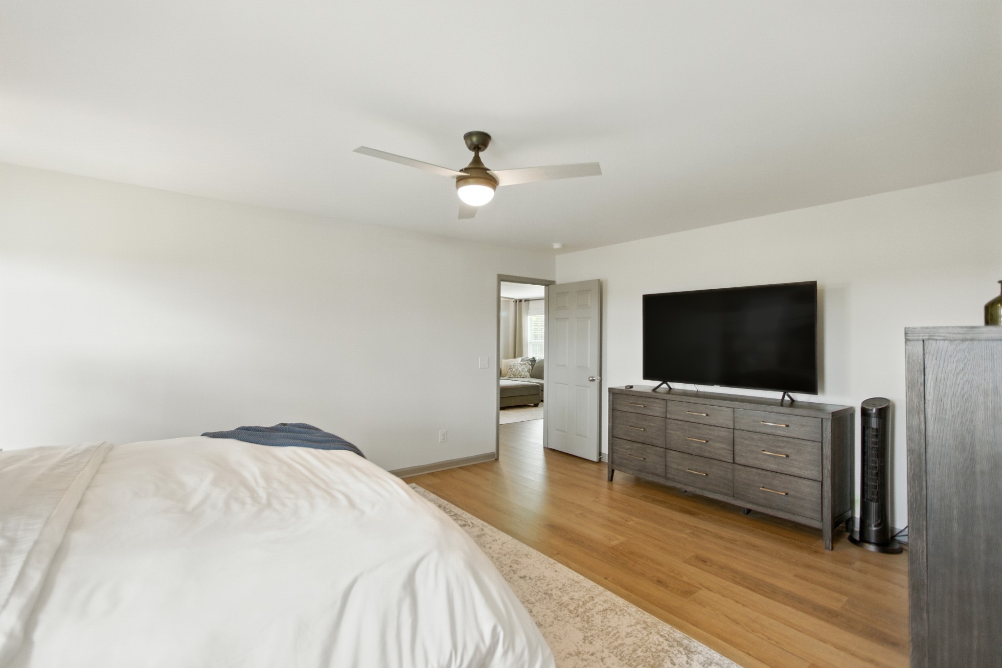 6411 Spring Creek Road Tullahoma, TN 37388 - Photo 27 of 57 a bedroom with a bed and a flat screen tv