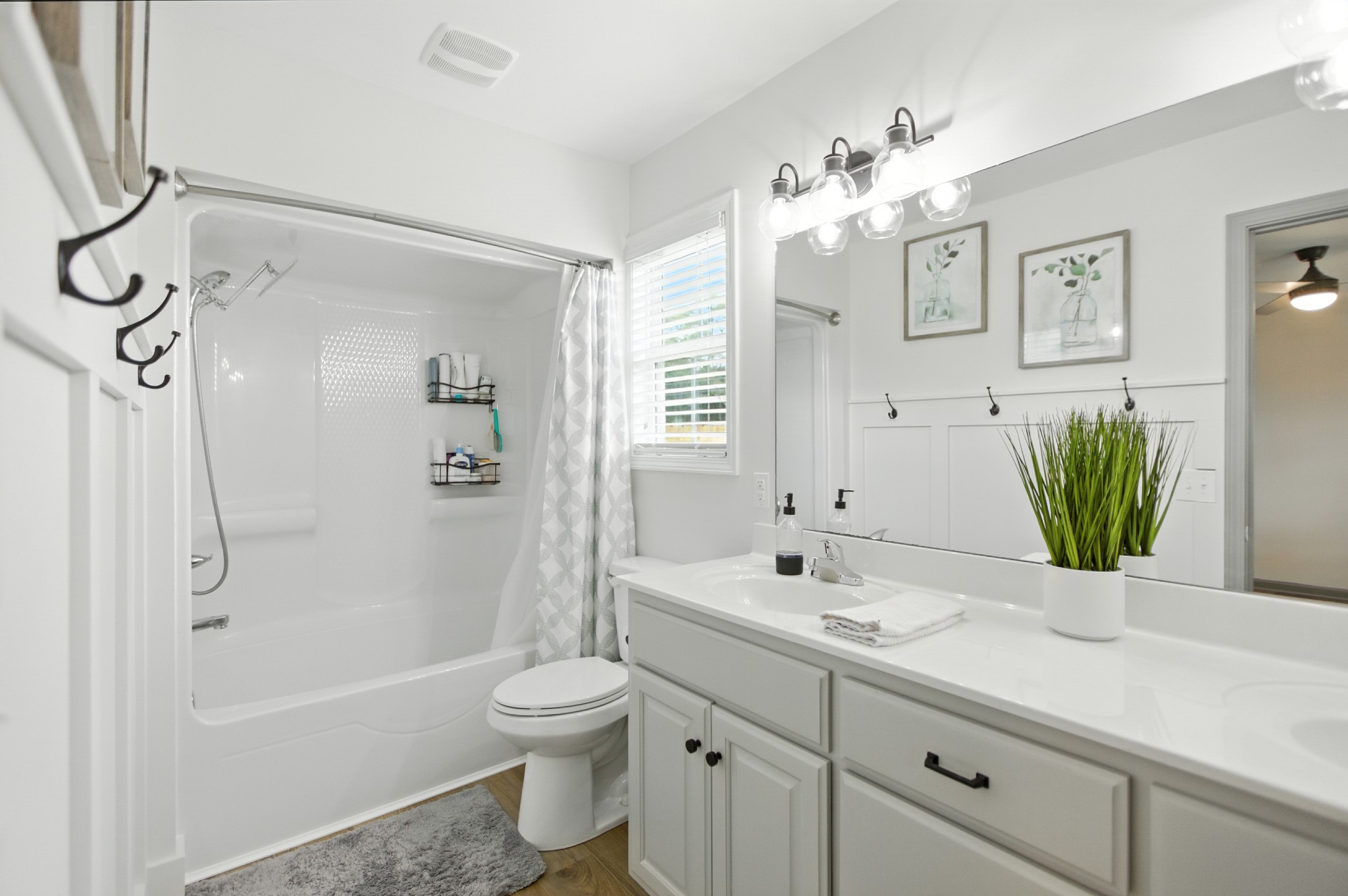 6411 Spring Creek Road Tullahoma, TN 37388 - Photo 29 of 57 a bathroom with a sink a toilet and shower
