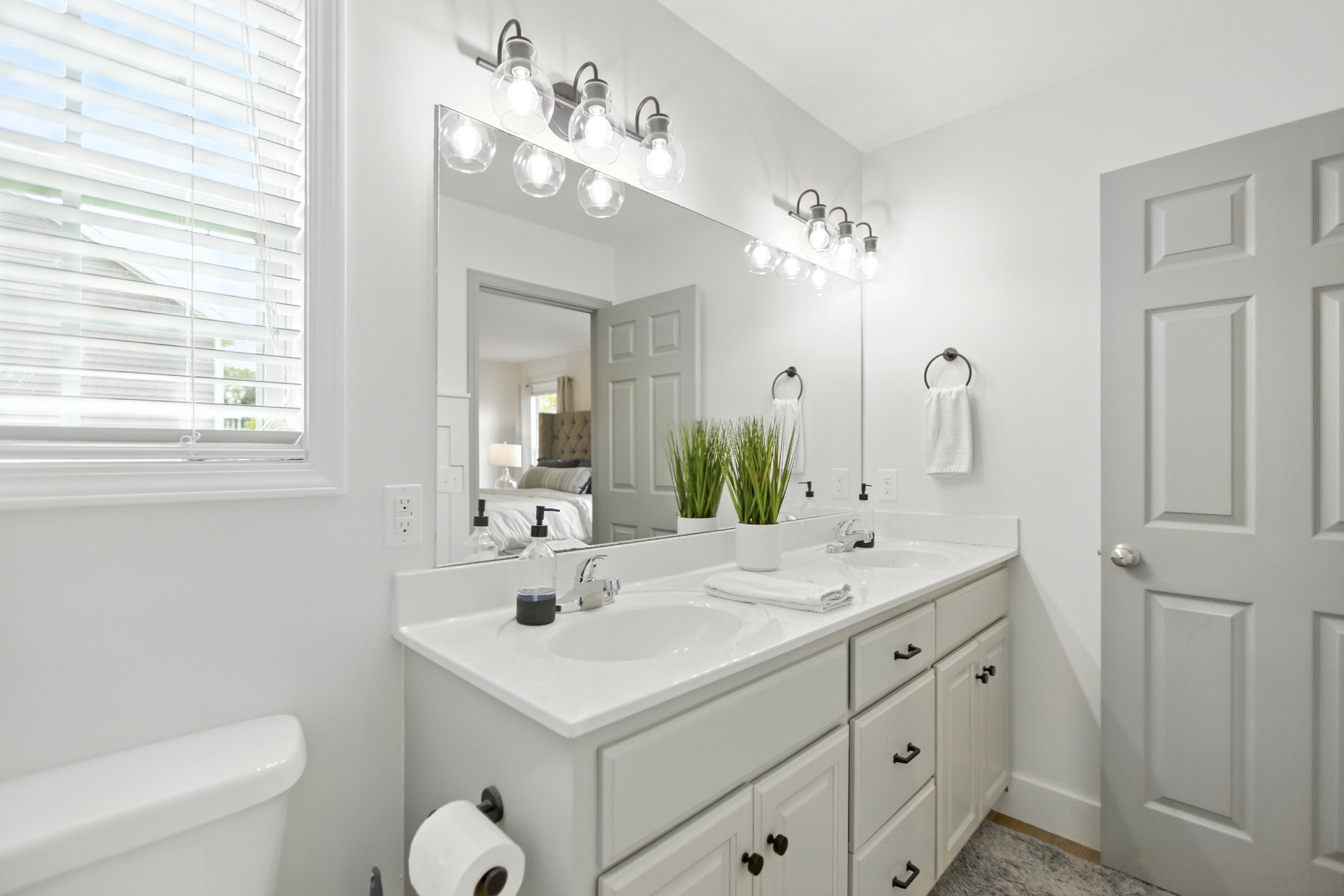 6411 Spring Creek Road Tullahoma, TN 37388 - Photo 30 of 57 a bathroom with a sink vanity granite and a toilet