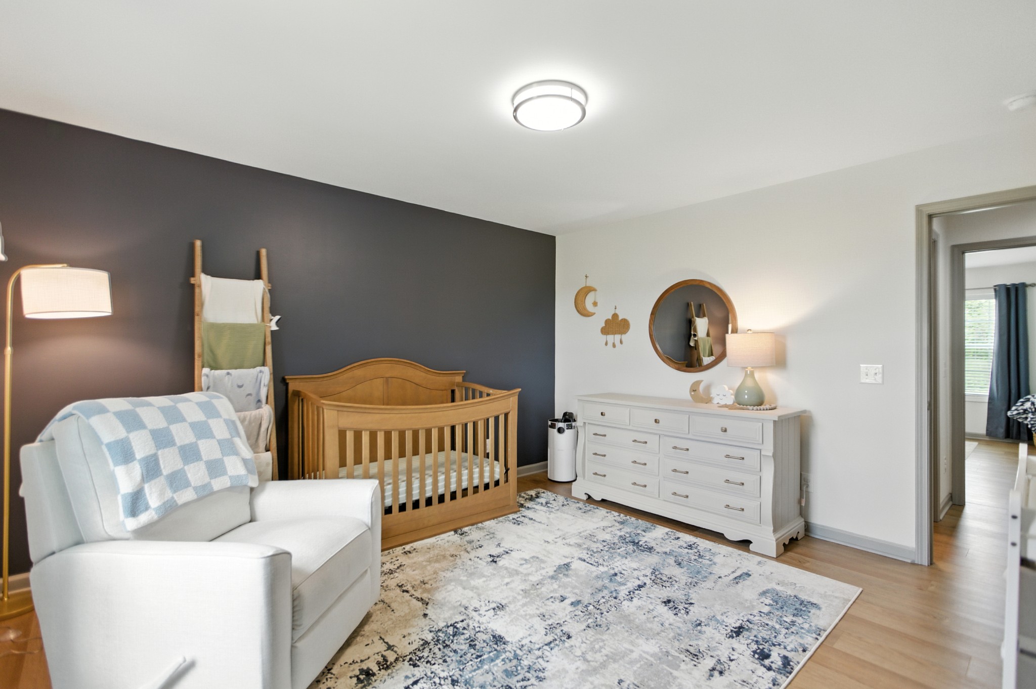 6411 Spring Creek Road Tullahoma, TN 37388 - Photo 34 of 57 a bedroom with a bed and a dresser