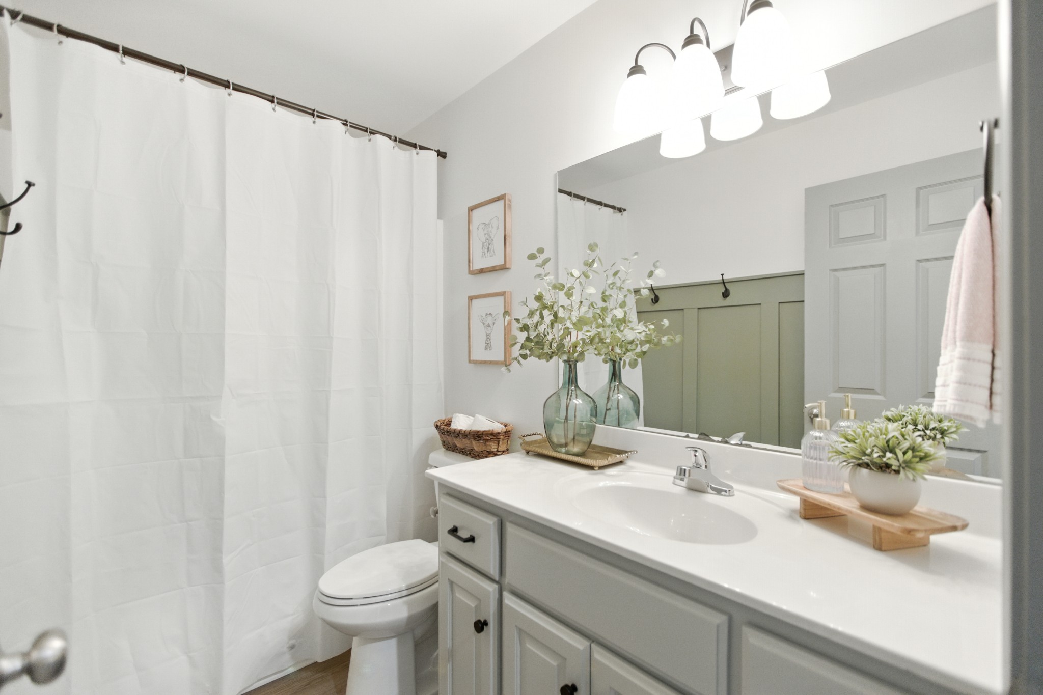6411 Spring Creek Road Tullahoma, TN 37388 - Photo 35 of 57 a bathroom with a sink vanity granite and toilet