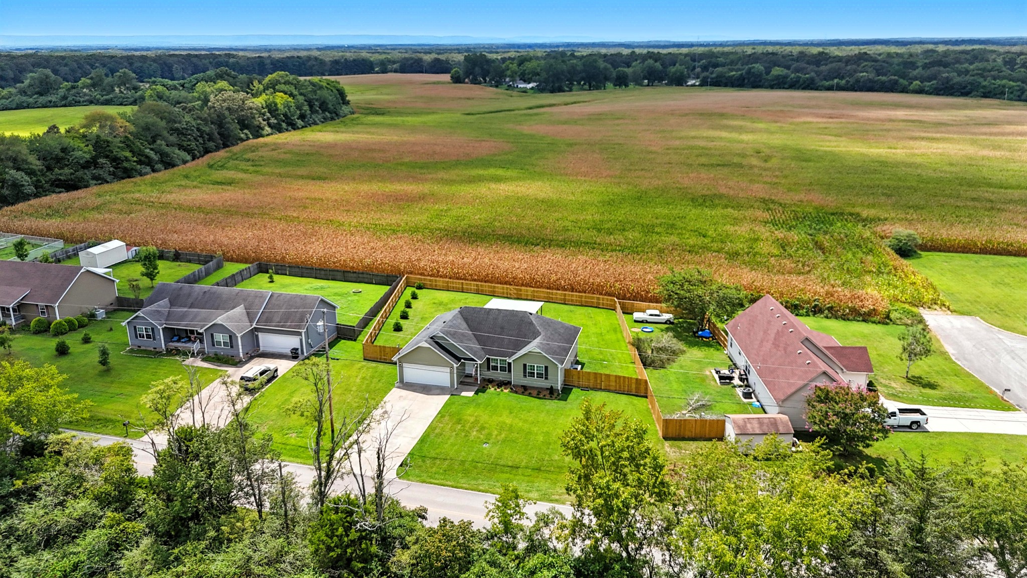 6411 Spring Creek Road Tullahoma, TN 37388 - Photo 4 of 57 an aerial view of a house with outdoor space swimming pool and mountains