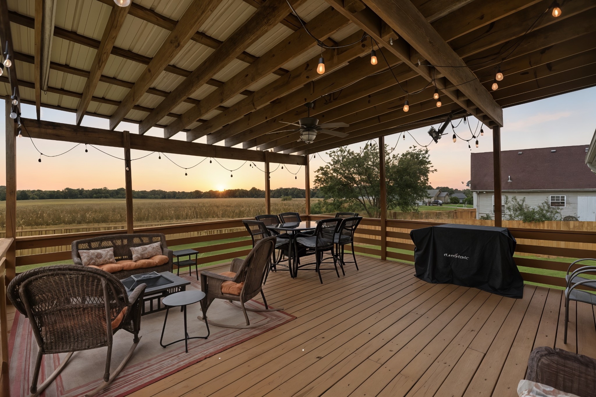 6411 Spring Creek Road Tullahoma, TN 37388 - Photo 42 of 57 a view of a roof deck with table and chairs with wooden floor