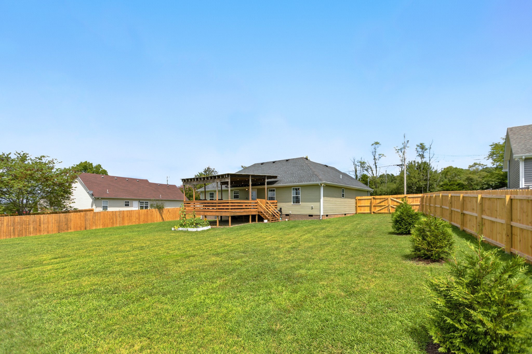 6411 Spring Creek Road Tullahoma, TN 37388 - Photo 49 of 57 a view of a house with a yard and sitting area