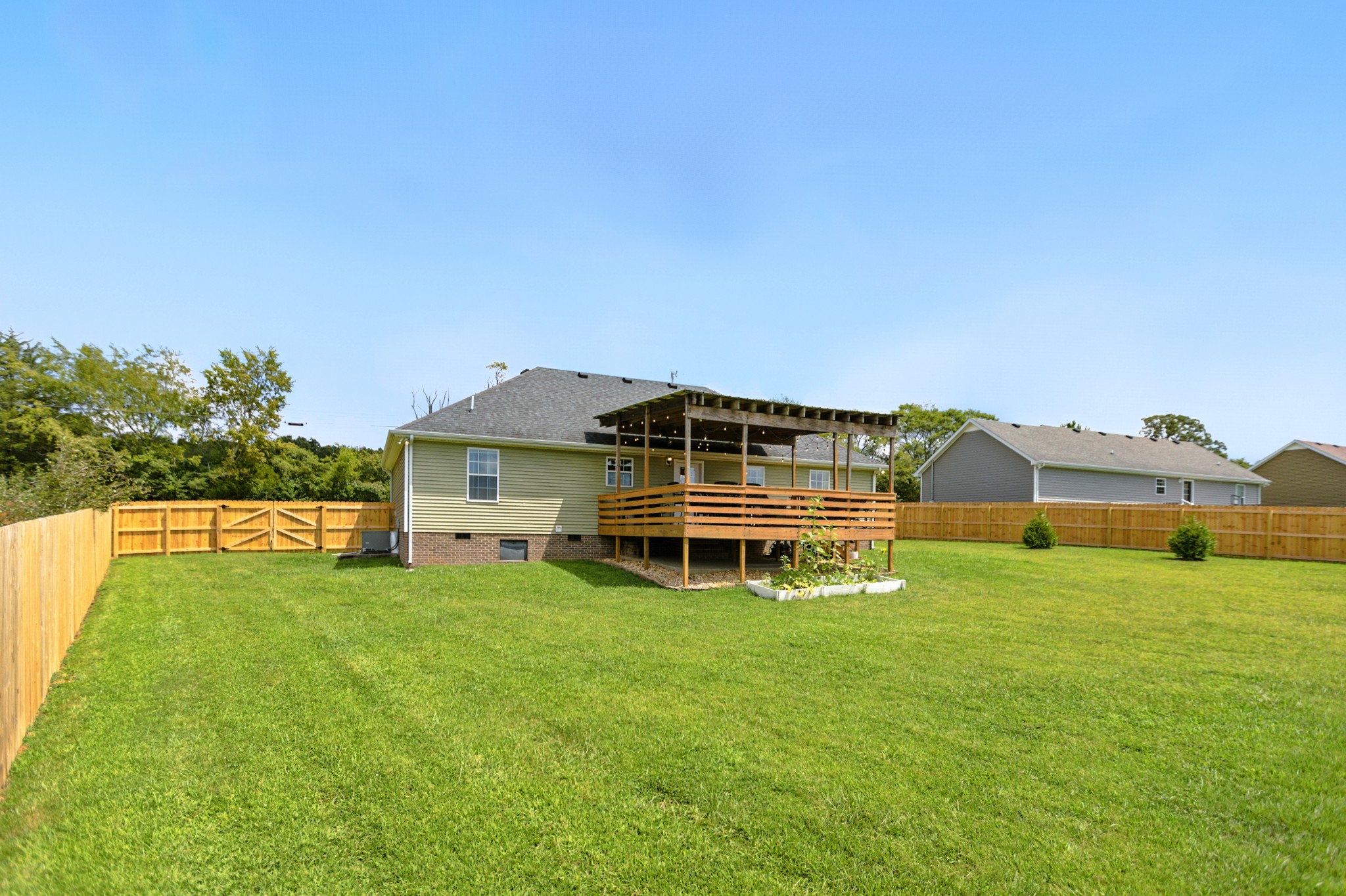 6411 Spring Creek Road Tullahoma, TN 37388 - Photo 5 of 57 a front view of a house with a yard