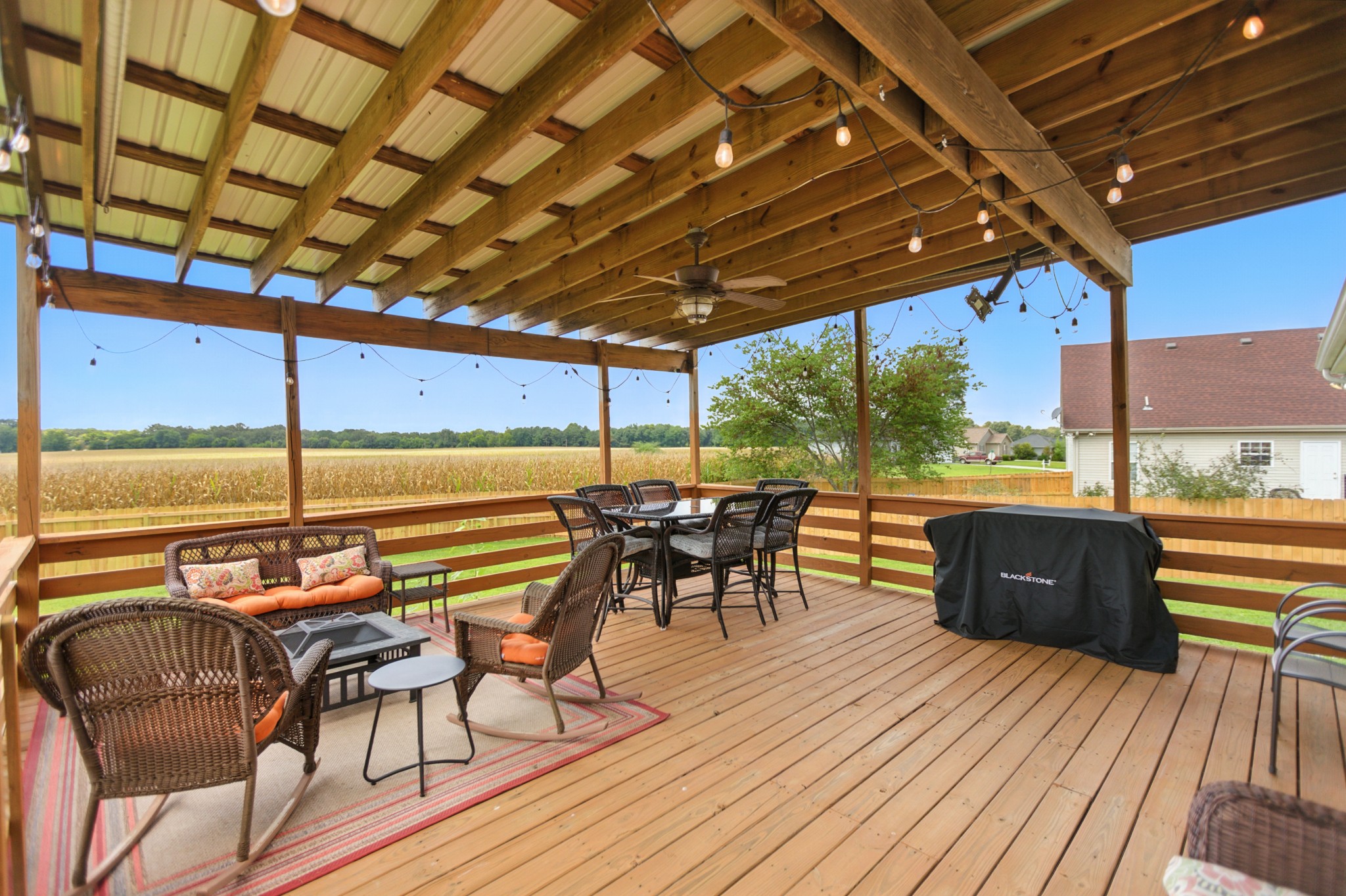 6411 Spring Creek Road Tullahoma, TN 37388 - Photo 8 of 57 a view of a balcony with furniture and wooden floor