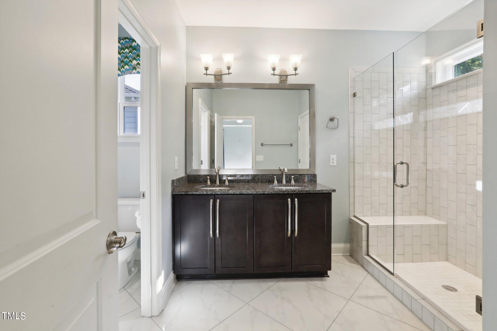 517 Plainview Avenue Raleigh, NC 27604 - Photo 37 of 58 Gorgeous, tiled master bathroom