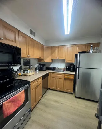 $1,880 | 5201 Geneva Court, Unit 209, Doral, FL 33166