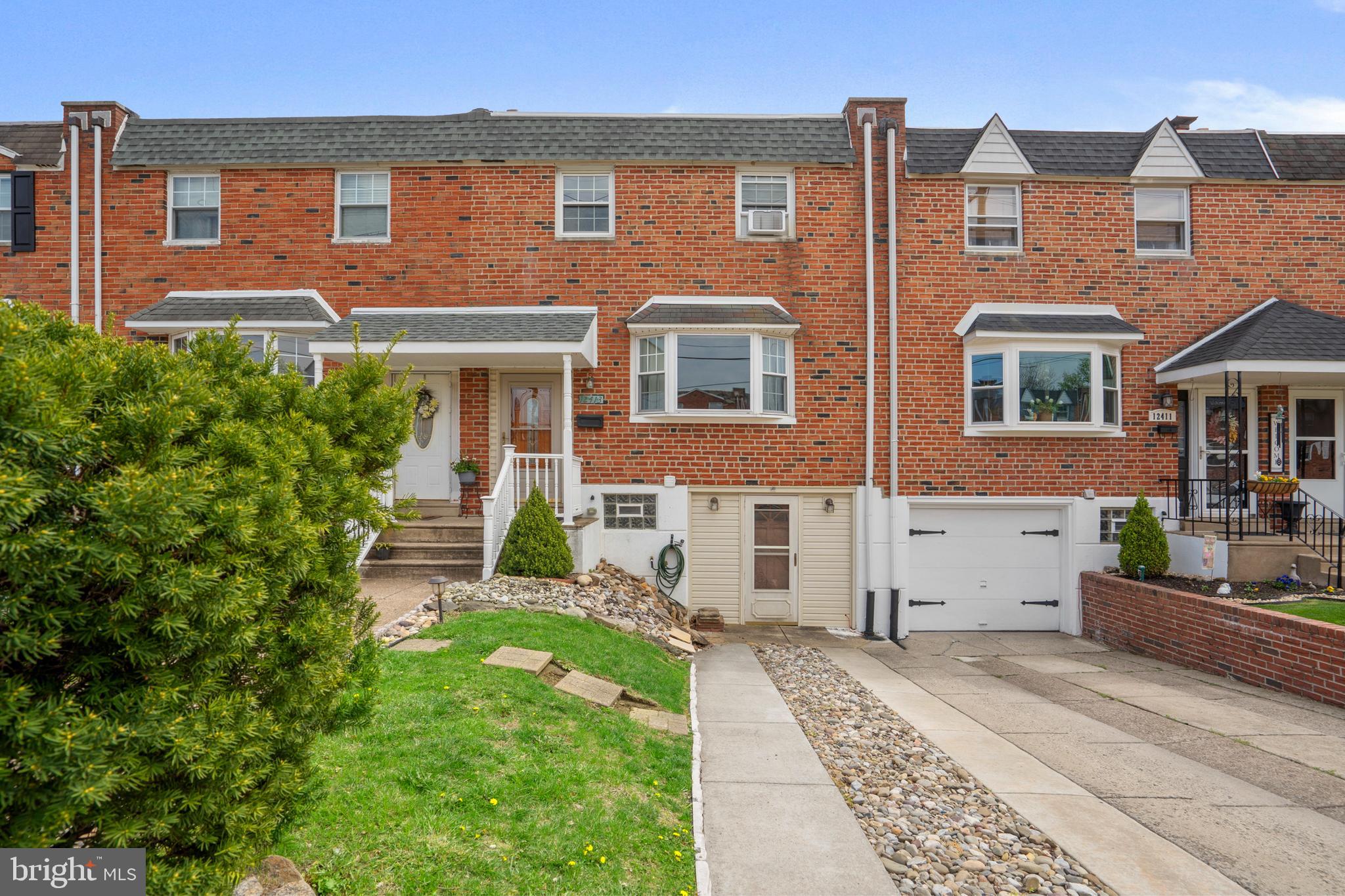 12413 Dunks Ferry Road Philadelphia, PA 19154 - Photo 1 of 35 front view of a house with a yard