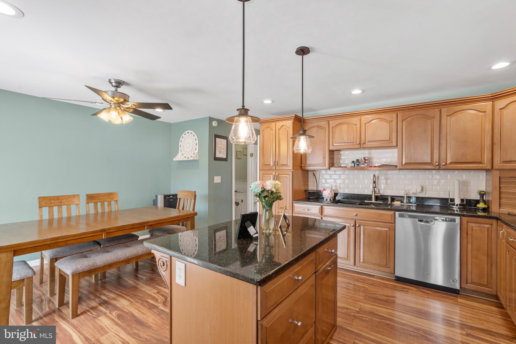 12413 Dunks Ferry Road Philadelphia, PA 19154 - Photo 13 of 35 a kitchen with stainless steel appliances granite countertop a sink a stove and a refrigerator