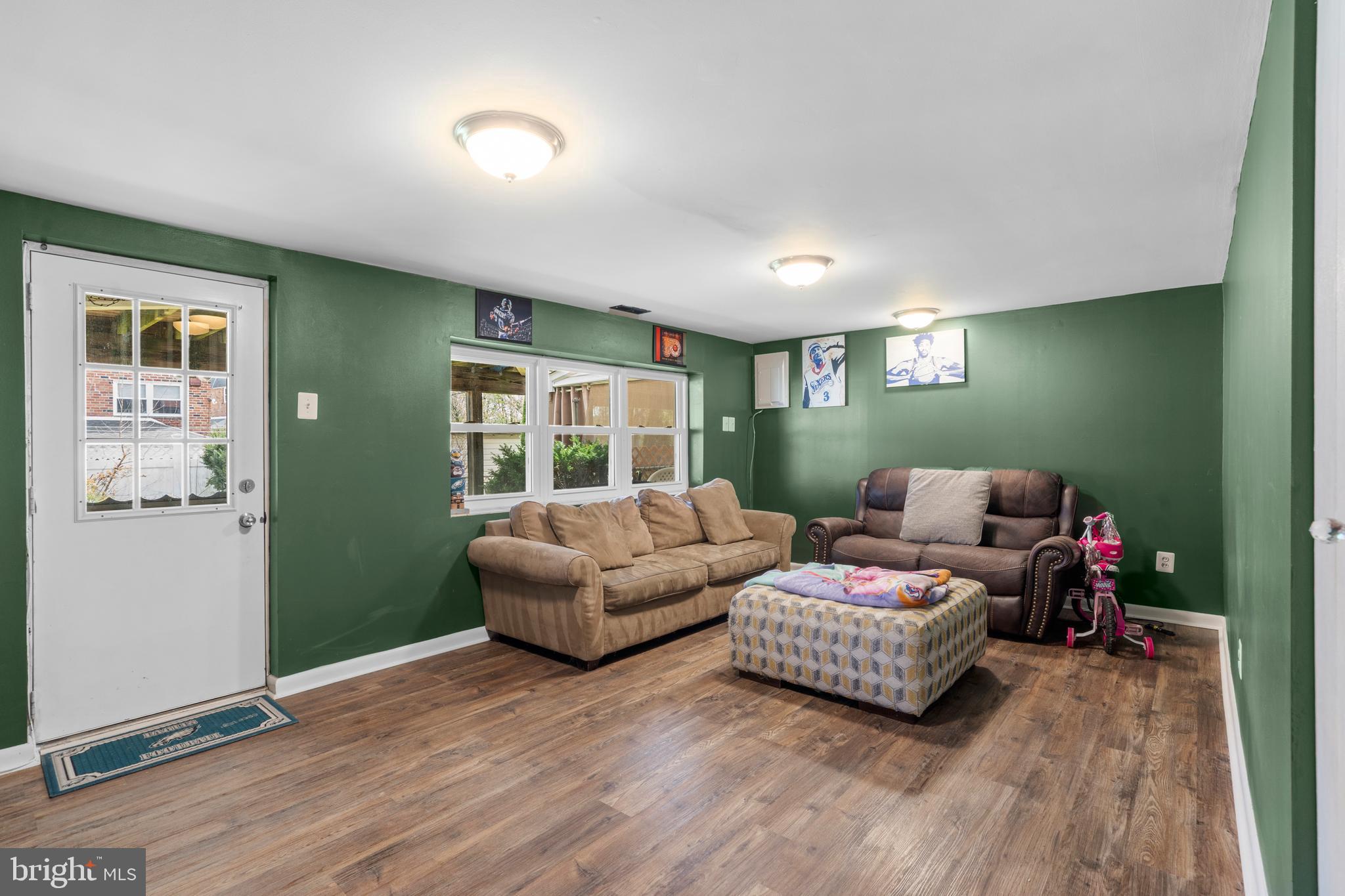 12413 Dunks Ferry Road Philadelphia, PA 19154 - Photo 24 of 35 a living room with furniture and a window