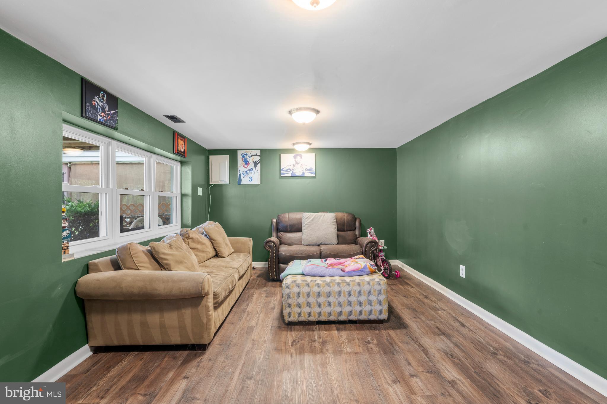 12413 Dunks Ferry Road Philadelphia, PA 19154 - Photo 25 of 35 a living room with furniture and a wooden floor