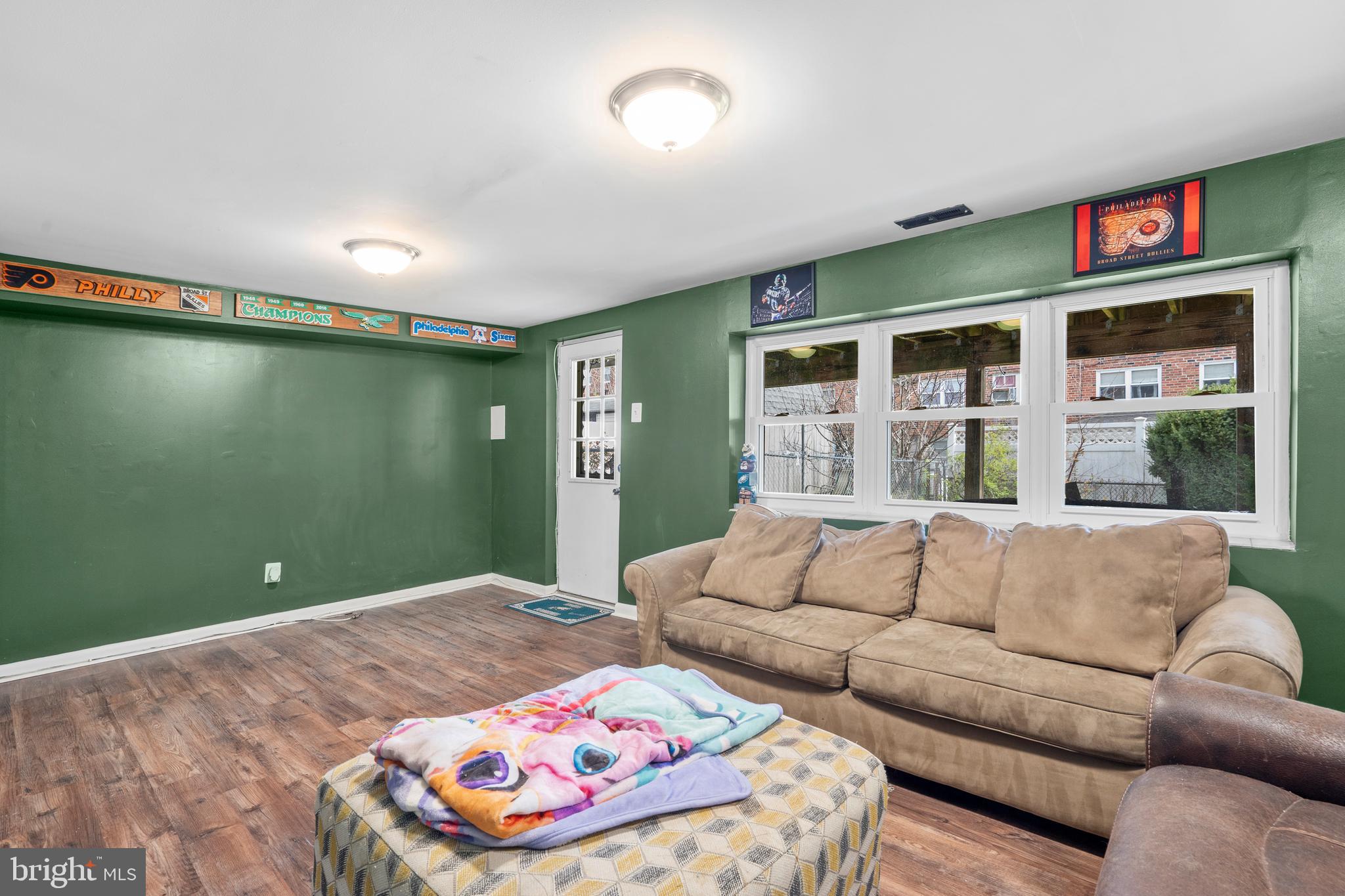 12413 Dunks Ferry Road Philadelphia, PA 19154 - Photo 27 of 35 a living room with furniture and a large window