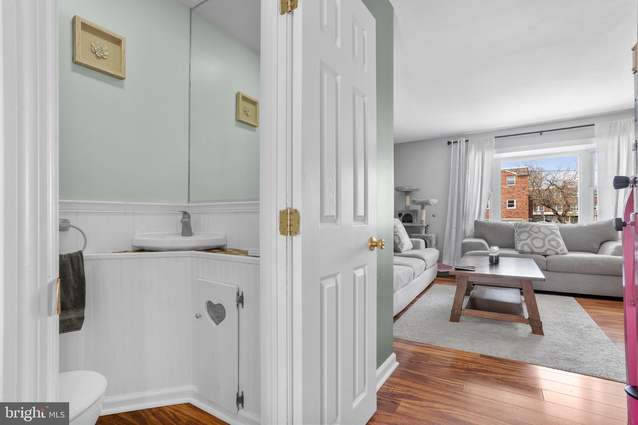 12413 Dunks Ferry Road Philadelphia, PA 19154 - Photo 9 of 35 a living room with furniture and a fireplace