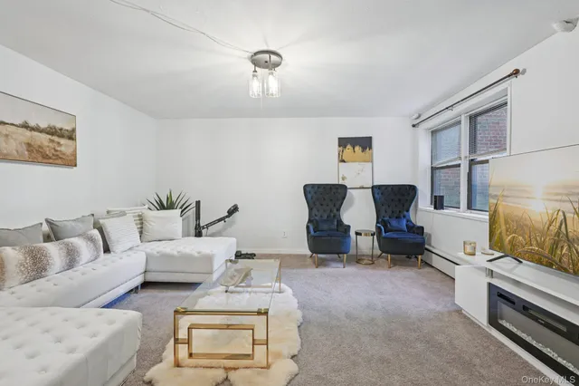 a living room with furniture and a couch