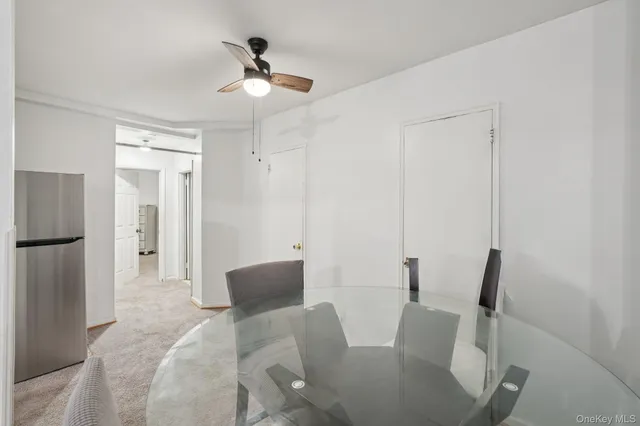 a bed room with a bed and a chair