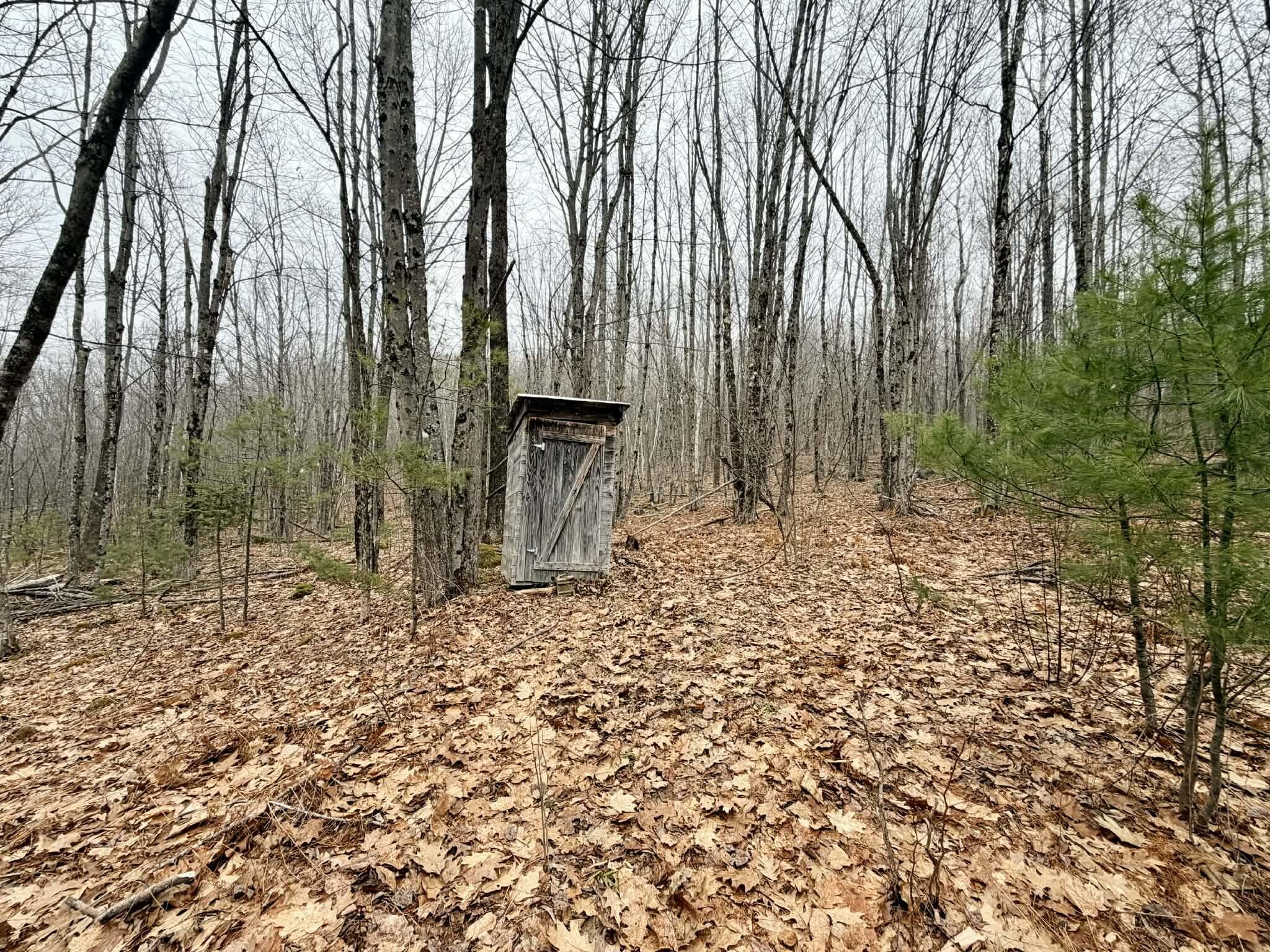 24 Blueberry Hill Road Chesterville, ME 04938 - Photo 27 of 31 Rustic outdoor privy