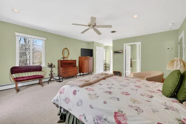 a view of a livingroom with furniture and window