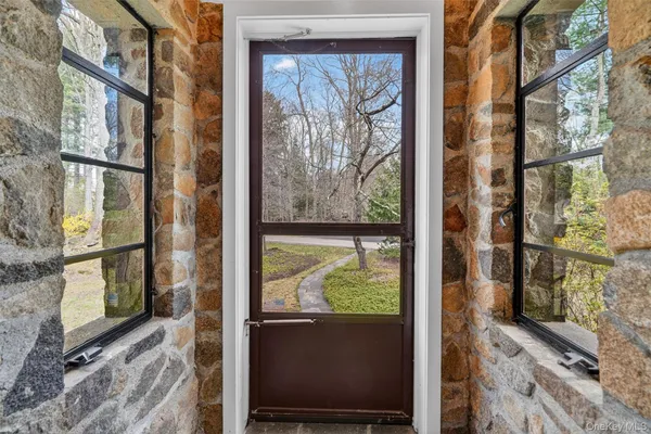 a view of a porch with a door