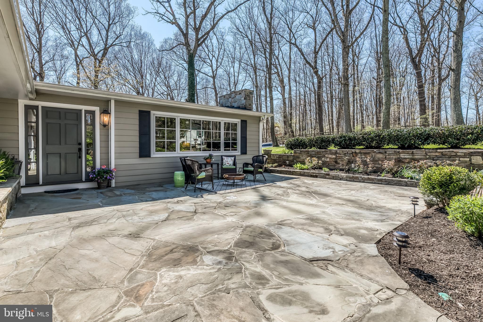 16519 Dubbs Road Sparks, MD 21152 - Photo 58 of 67 Front stone terrace with stone sitting wall