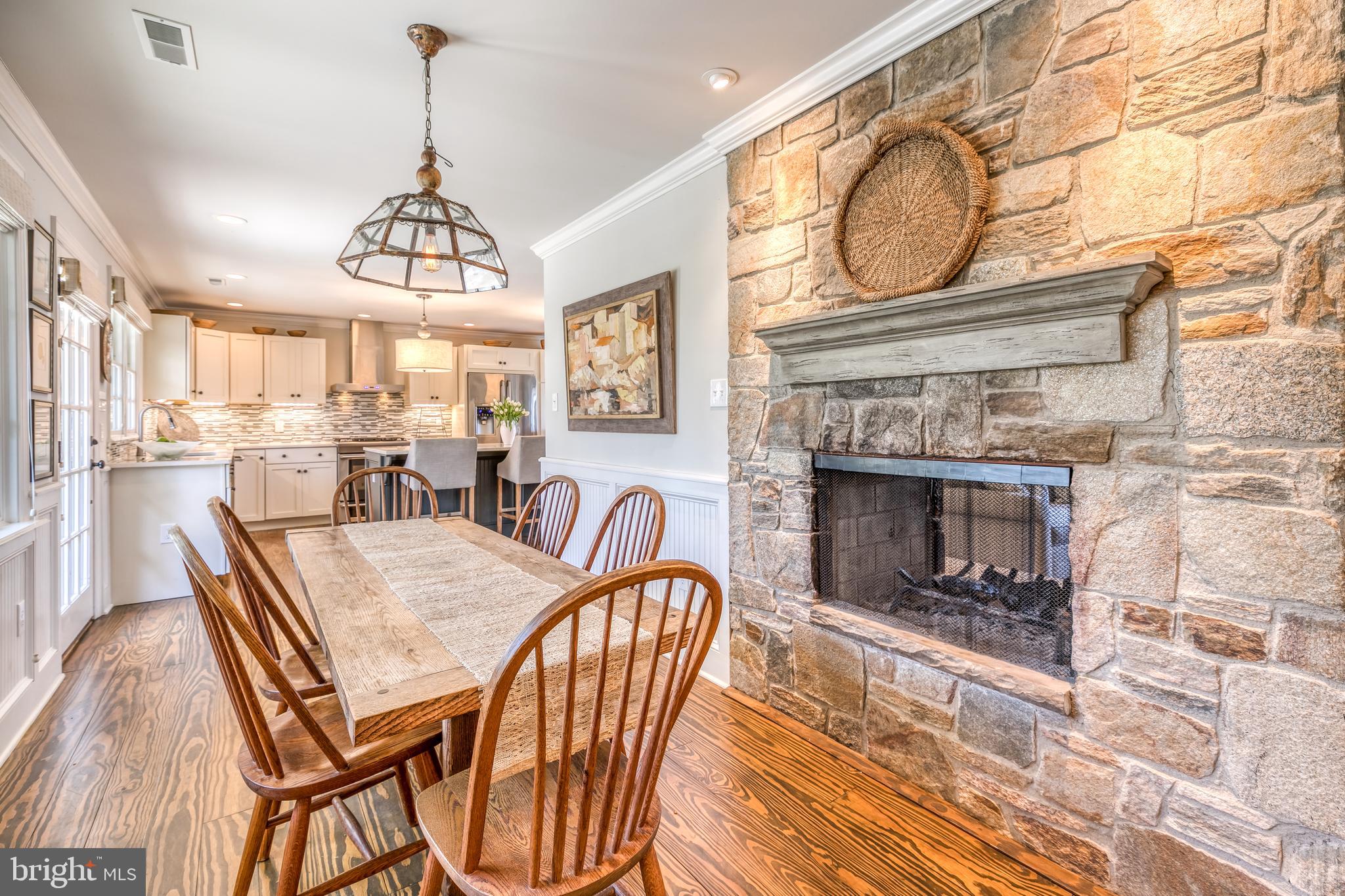 16519 Dubbs Road Sparks, MD 21152 - Photo 9 of 67 Breakfast Room see-thru wood burning fireplace