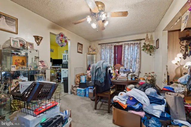 a room with furniture and a flat screen tv