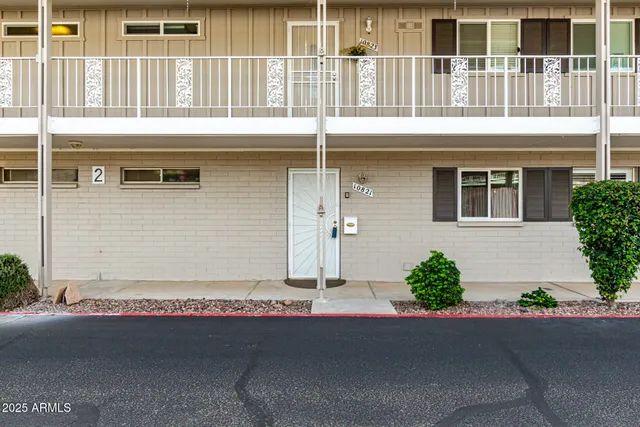 a front view of a house with a garage