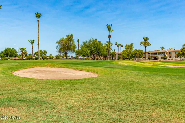 a view of a park with welcome board