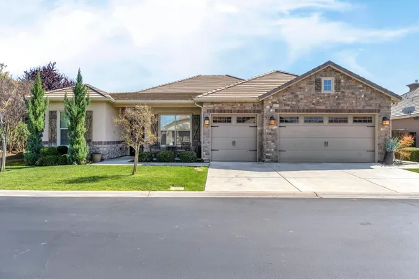 a house view with a outdoor space