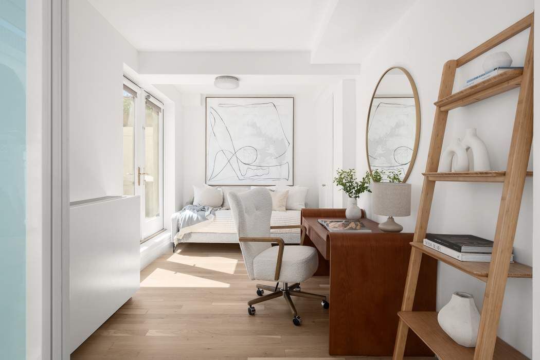 435 East 76th Street, Unit PHB Manhattan, NY 10021 - Photo 11 of 28 a living room with furniture a window and a potted plant