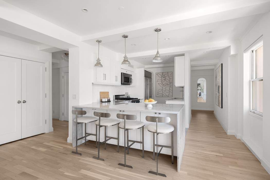 435 East 76th Street, Unit PHB Manhattan, NY 10021 - Photo 19 of 28 a view of a dining room with furniture