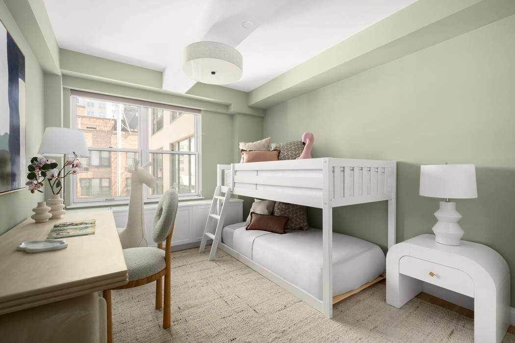 435 East 76th Street, Unit PHB Manhattan, NY 10021 - Photo 21 of 28 a living room with furniture and a table
