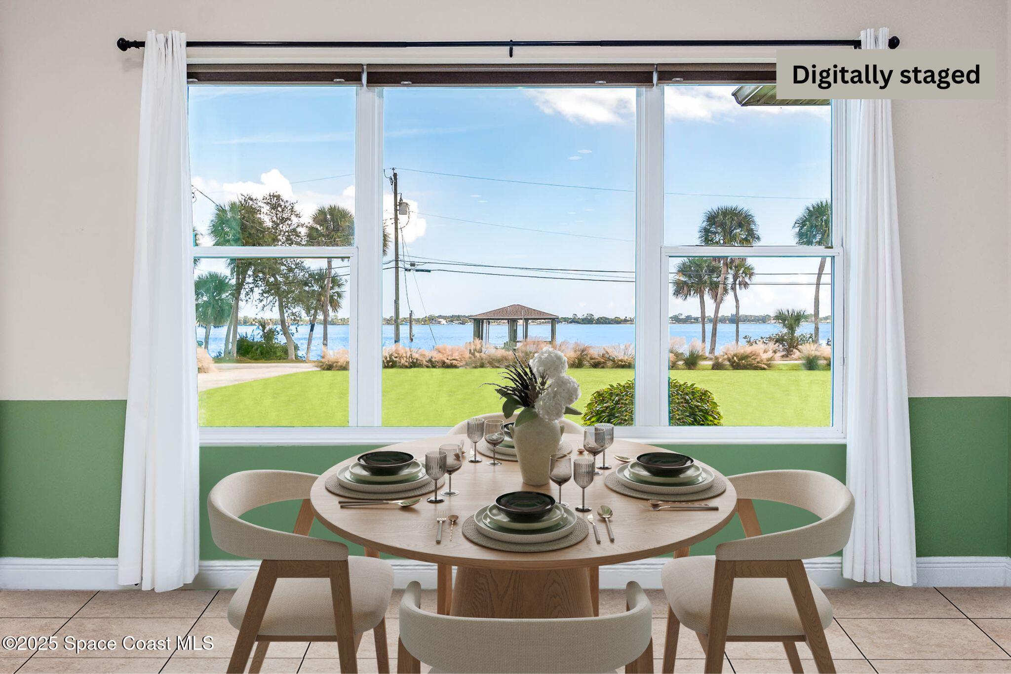 1953 Rockledge Drive Rockledge, FL 32955 - Photo 11 of 83 a view of a dining room with furniture window and outside view
