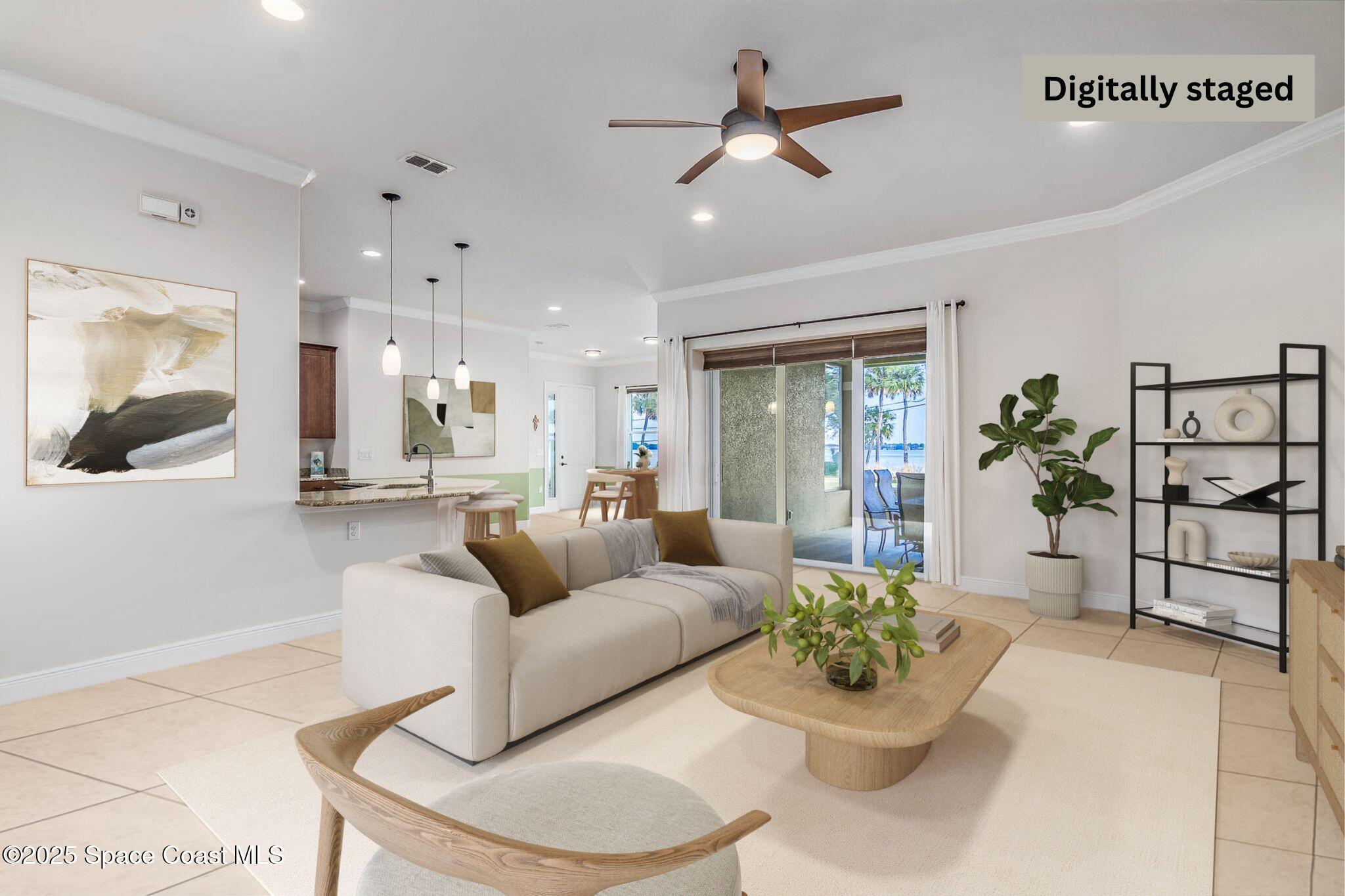 1953 Rockledge Drive Rockledge, FL 32955 - Photo 20 of 83 a living room with furniture and a potted plant