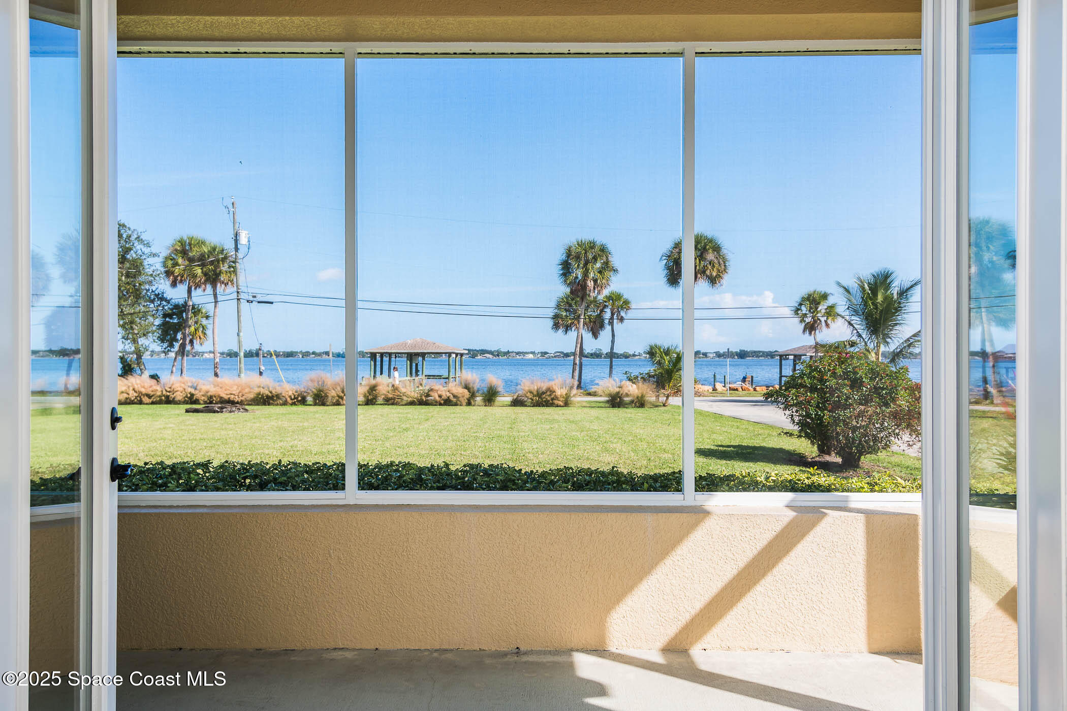 1953 Rockledge Drive Rockledge, FL 32955 - Photo 37 of 83 Screened Porch with Water View