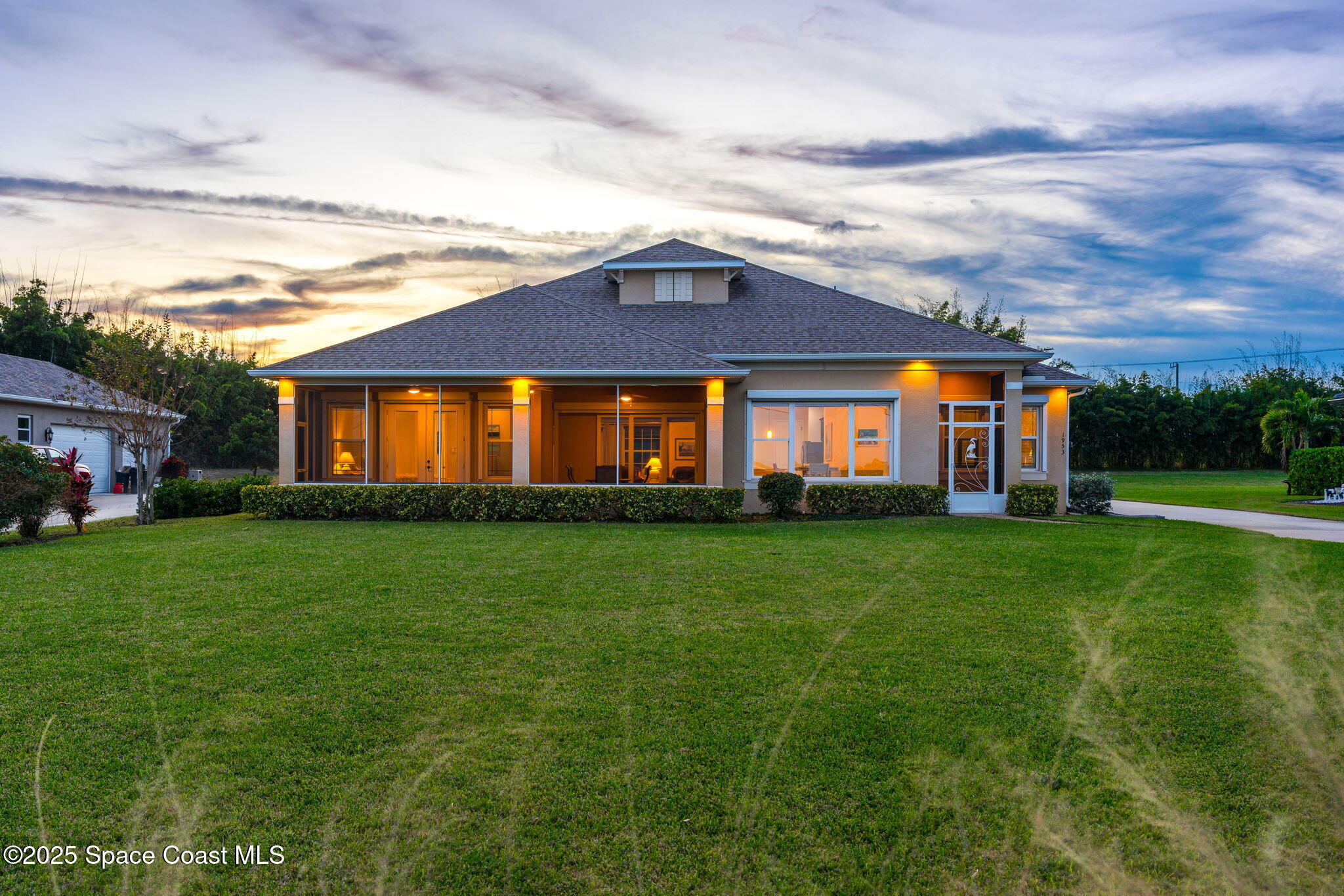 1953 Rockledge Drive Rockledge, FL 32955 - Photo 42 of 83 a front view of a house with a garden