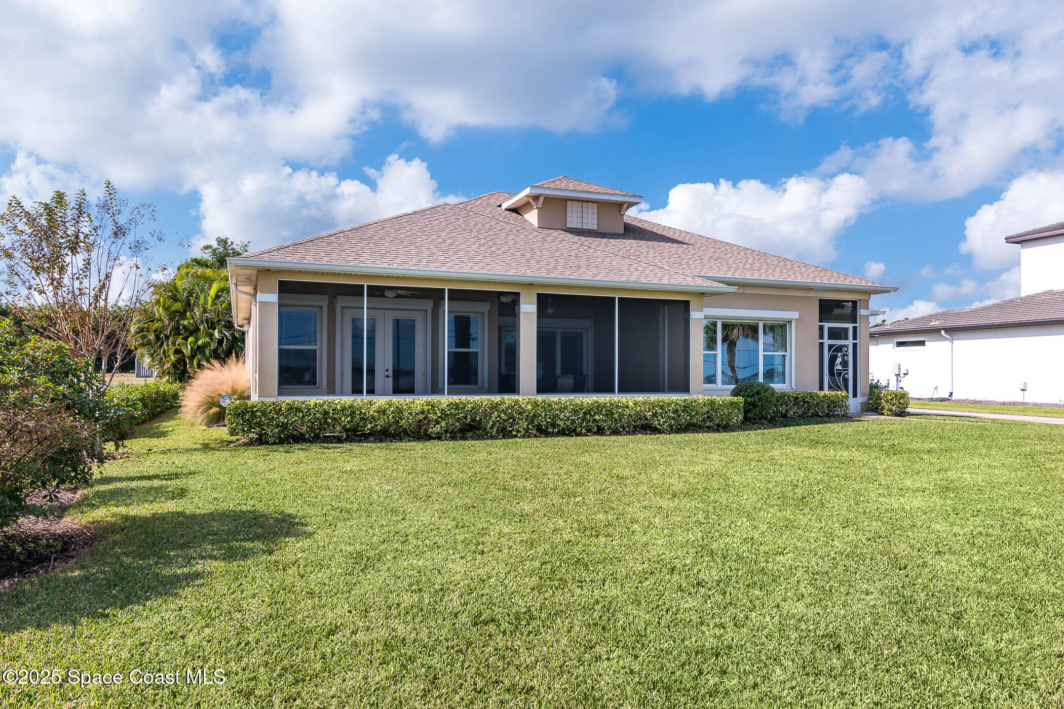 1953 Rockledge Drive Rockledge, FL 32955 - Photo 46 of 83 a front view of a house with a garden