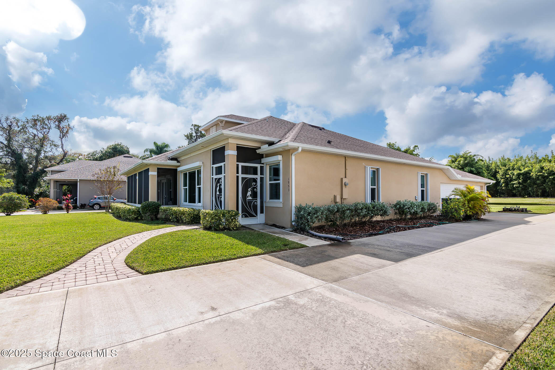 1953 Rockledge Drive Rockledge, FL 32955 - Photo 48 of 83 a front view of house with yard and green space