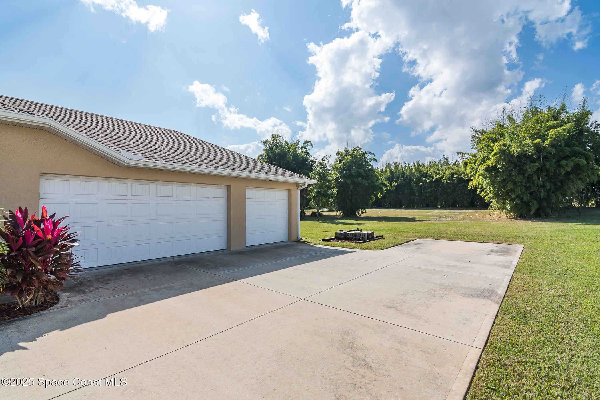 1953 Rockledge Drive Rockledge, FL 32955 - Photo 50 of 83 a view of a house with swimming pool and a yard