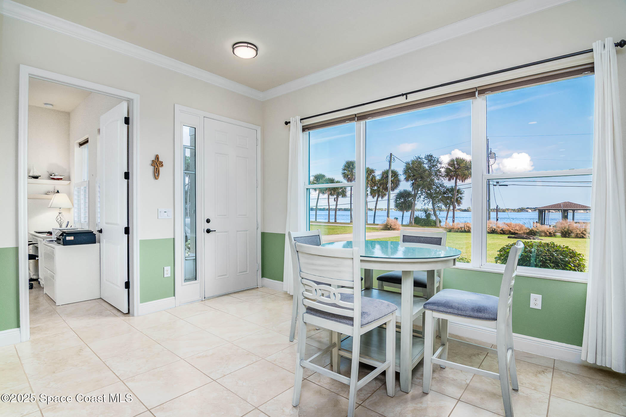 1953 Rockledge Drive Rockledge, FL 32955 - Photo 53 of 83 a view of a dining room with furniture window and wooden floor