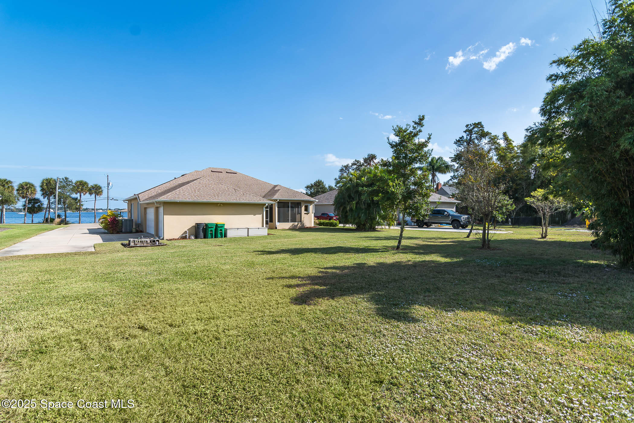 1953 Rockledge Drive Rockledge, FL 32955 - Photo 70 of 83 a front view of a house with a yard
