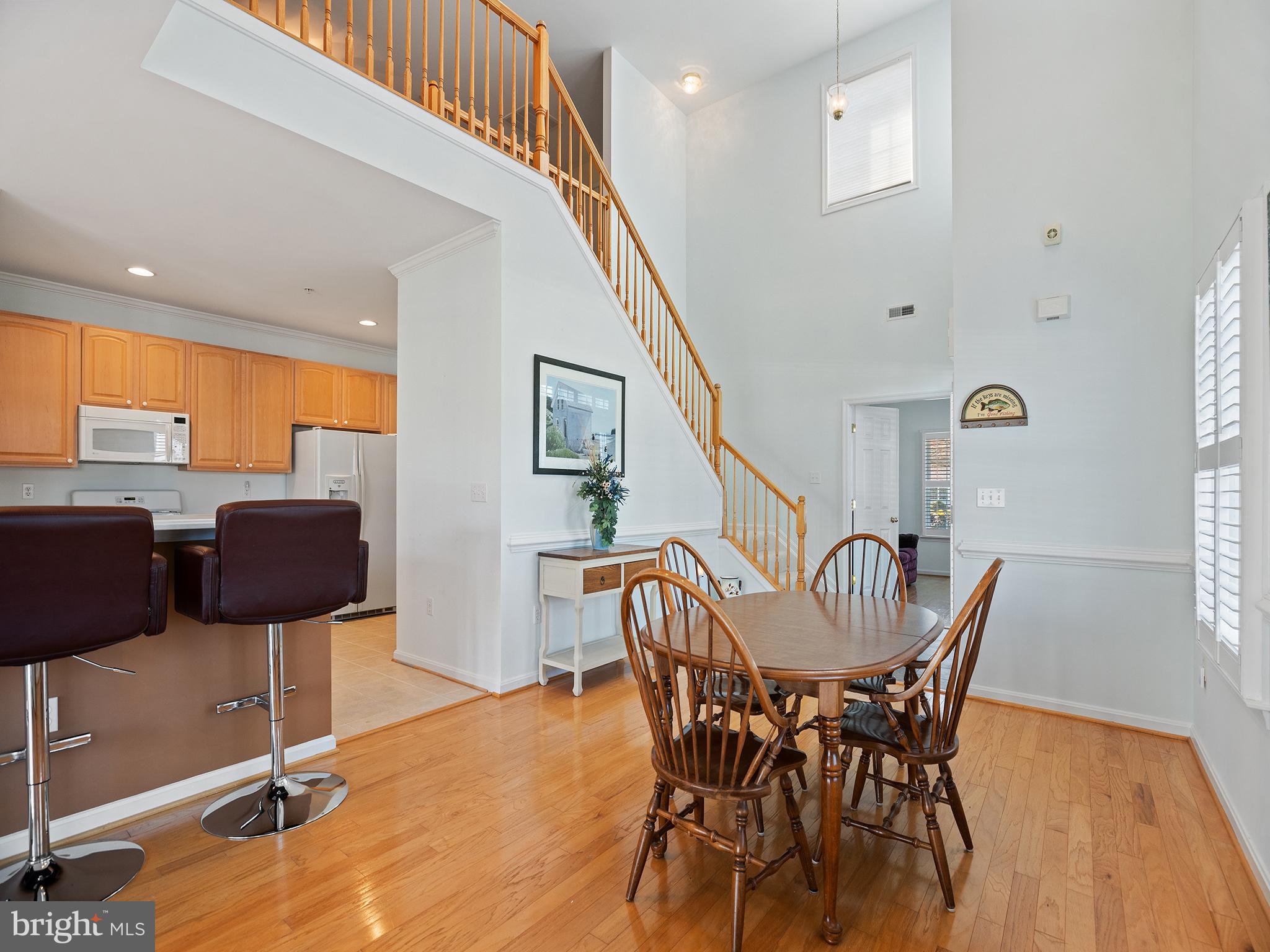 606 Ruxton Road, Unit 51 Dowell, MD 20629 - Photo 8 of 42 Dining and kitchen proximity