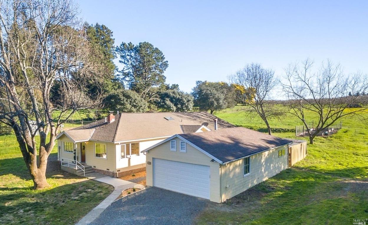 7725 Kennedy Road Sebastopol, CA 95472 - Photo 1 of 1 a aerial view of a house with a yard table and chairs