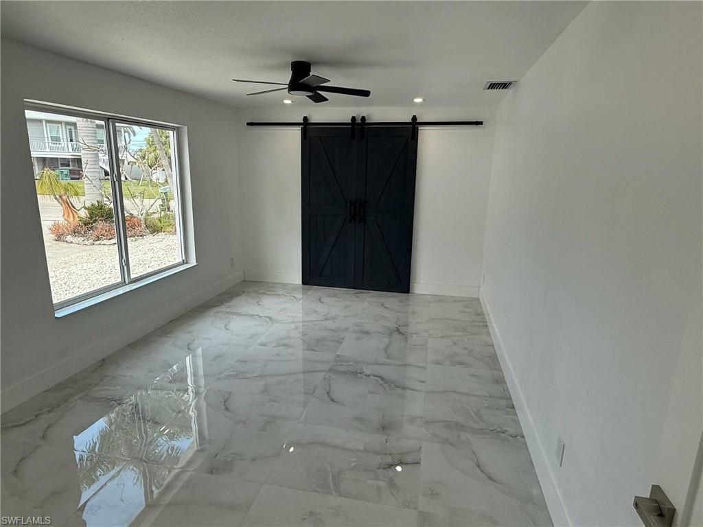 2823 Janet Street Matlacha, FL 33993 - Photo 2 of 16 a view of an empty room with a window