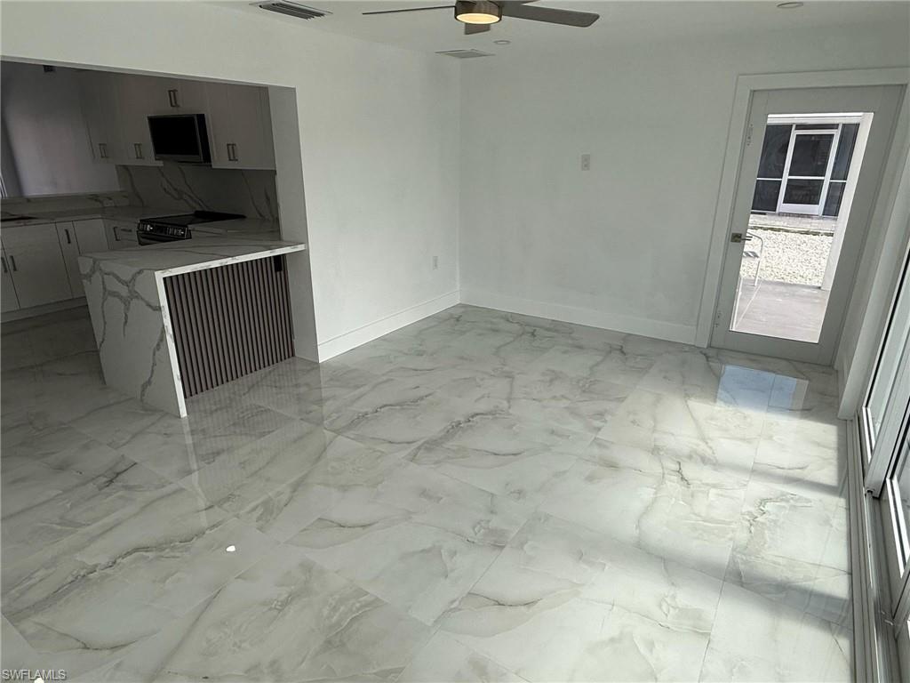 2823 Janet Street Matlacha, FL 33993 - Photo 5 of 16 a view of kitchen with cabinets