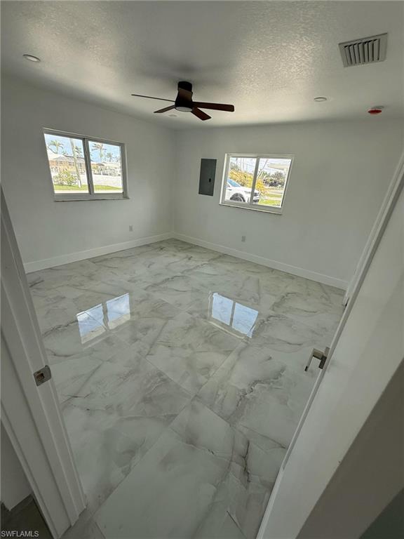 2823 Janet Street Matlacha, FL 33993 - Photo 10 of 16 a view of an empty room with windows