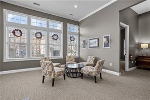 409 Stockton Ridge Cranberry Township, PA 16066 - Photo 18 of 19 a living room with furniture and a large window